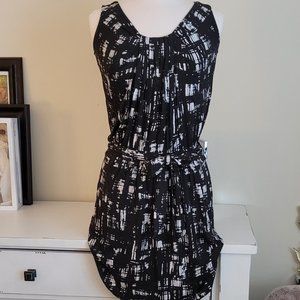Sleeveless black & beige print dress w/ fabric tie belt